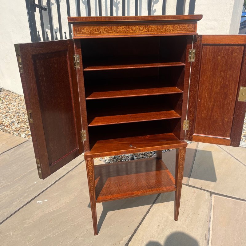 A Fine Quality Edwards and Roberts Of London marquetry inlaid music cabinet